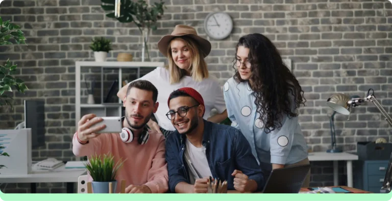 a team taking a selfie